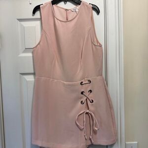 NWT BCBGeneration pink romper with lace up detail